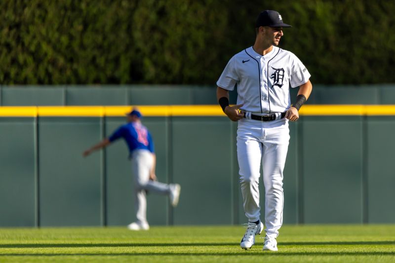 Aug 22, 2023; Detroit, Michigan, USA; Detroit Tigers second baseman Zack Short (59) warms up before the game against the Chicago Cubs at Comerica Park. Mandatory Credit: David Reginek-USA TODAY Sports