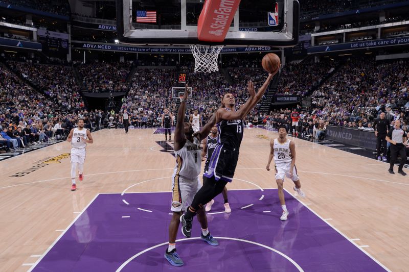 SACRAMENTO, CA - FEBRUARY 8:  Keegan Murray #13 of the Sacramento Kings drives to the basket during the game against the New Orleans Pelicans on February 8, 2025 at Golden 1 Center in Sacramento, California. NOTE TO USER: User expressly acknowledges and agrees that, by downloading and or using this Photograph, user is consenting to the terms and conditions of the Getty Images License Agreement. Mandatory Copyright Notice: Copyright 2025 NBAE (Photo by Rocky Widner/NBAE via Getty Images)