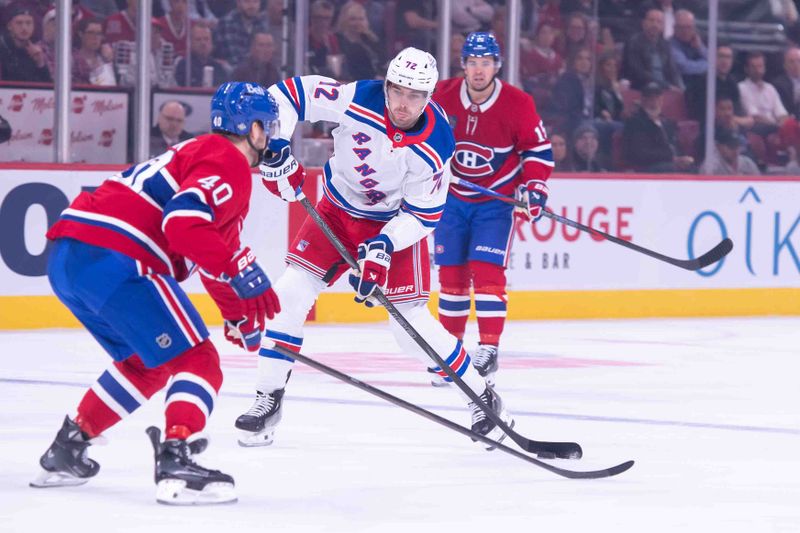 Oct 22, 2024; Ottawa, Ontario, CAN; New York Rangers center Filip Chytil (72) prepares to shoot the puck past Montreal Canadiens right wing Joel Armia (40) in the first period at the Bell Centre. Mandatory Credit: Marc DesRosiers-Imagn Images