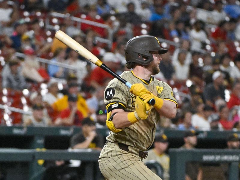 Aug 27, 2024; St. Louis, Missouri, USA;  San Diego Padres designated hitter Jake Cronenworth (9) hits a one run single against the St. Louis Cardinals during the seventh inning at Busch Stadium. Mandatory Credit: Jeff Curry-USA TODAY Sports
