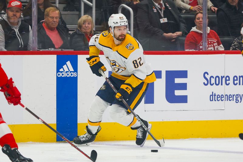 Dec 29, 2023; Detroit, Michigan, USA; Nashville Predators center Tommy Novak (82) handles the puck during the first of the game between the Nashville Predators and the Detroit Red Wings at Little Caesars Arena. Mandatory Credit: Brian Bradshaw Sevald-USA TODAY Sports