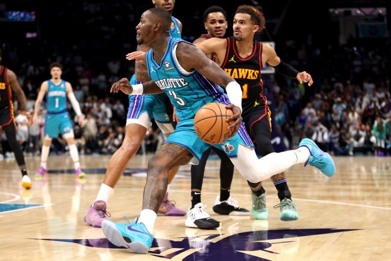 CHARLOTTE, NORTH CAROLINA - OCTOBER 25: Terry Rozier #3 of the Charlotte Hornets dribbles to the basket during the second half of a basketball game against the Atlanta Hawks at Spectrum Center on October 25, 2023 in Charlotte, North Carolina. NOTE TO USER: User expressly acknowledges and agrees that, by downloading and or using this photograph, User is consenting to the terms and conditions of the Getty Images License Agreement. (Photo by David Jensen/Getty Images)