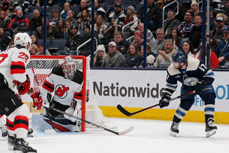 Jan 19, 2024; Columbus, Ohio, USA; New Jersey Devils goalie Vitek Vanecek (41) makes a save on the shot from Columbus Blue Jackets right wing Justin Danforth (17) during the third period at Nationwide Arena. Mandatory Credit: Russell LaBounty-USA TODAY Sports