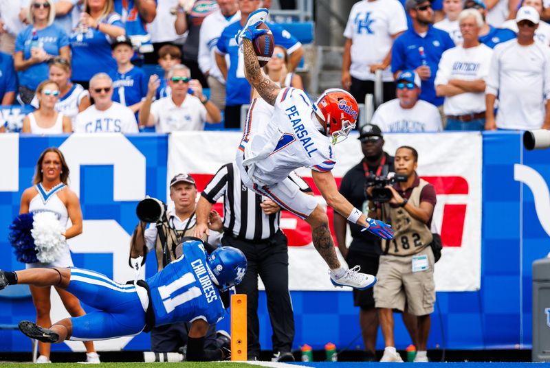 Sep 30, 2023; Lexington, Kentucky, USA; Florida Gators wide receiver Ricky Pearsall (1) falls into the end zone for a touchdown during the third quarter against the Kentucky Wildcats at Kroger Field. Mandatory Credit: Jordan Prather-USA TODAY Sports