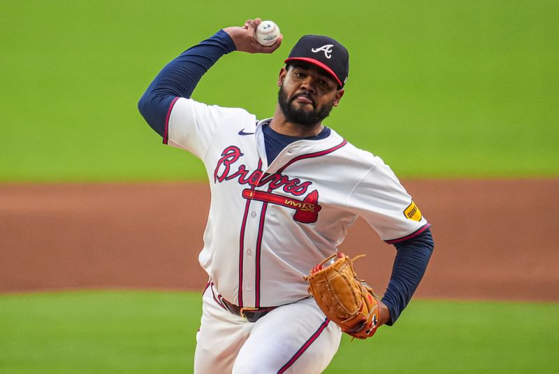 Sep 5, 2024; Cumberland, Georgia, USA; Atlanta Braves starting pitcher Reynaldo Lopez (40) pitches against the Colorado Rockies during the first inning at Truist Park. Mandatory Credit: Dale Zanine-Imagn Images