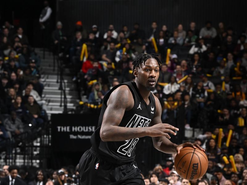 BROOKLYN, NY - JANUARY 25: Dorian Finney-Smith #28 of the Brooklyn Nets dribbles the ball during the game against the Minnesota Timberwolves on January 25, 2024 at Barclays Center in Brooklyn, New York. NOTE TO USER: User expressly acknowledges and agrees that, by downloading and or using this Photograph, user is consenting to the terms and conditions of the Getty Images License Agreement. Mandatory Copyright Notice: Copyright 2024 NBAE (Photo by David Dow/NBAE via Getty Images)