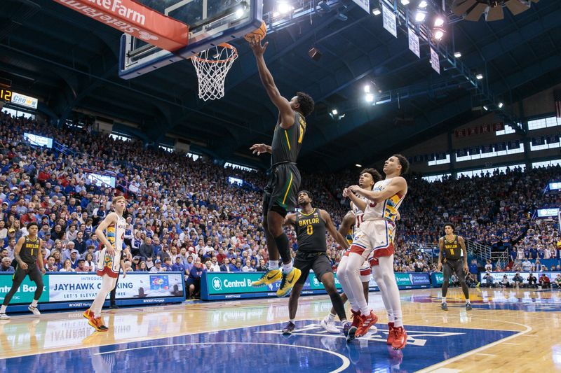 Feb 18, 2023; Lawrence, Kansas, USA; Baylor Bears guard Adam Flagler (10) puts up a shot during the first half against the Kansas Jayhawks at Allen Fieldhouse. Mandatory Credit: William Purnell-USA TODAY Sports