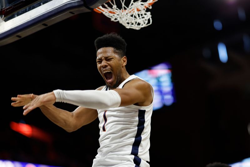 Jan 28, 2023; Charlottesville, Virginia, USA; Virginia Cavaliers forward Jayden Gardner (1) celebrates after dunking the ball against the Boston College Eagles in the second half at John Paul Jones Arena. Mandatory Credit: Geoff Burke-USA TODAY Sports