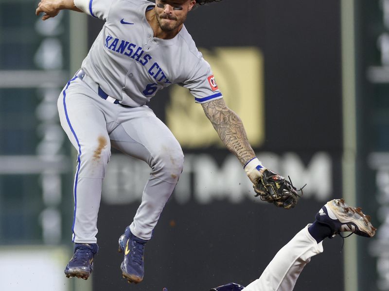 May 13, 2025; Houston, Texas, USA; Houston Astros center fielder Jake Meyers (6) is tagged out by Kansas City Royals second baseman Jonathan India (6) while trying to steal second base in the fourth inning at Daikin Park. Mandatory Credit: Thomas Shea-Imagn Images