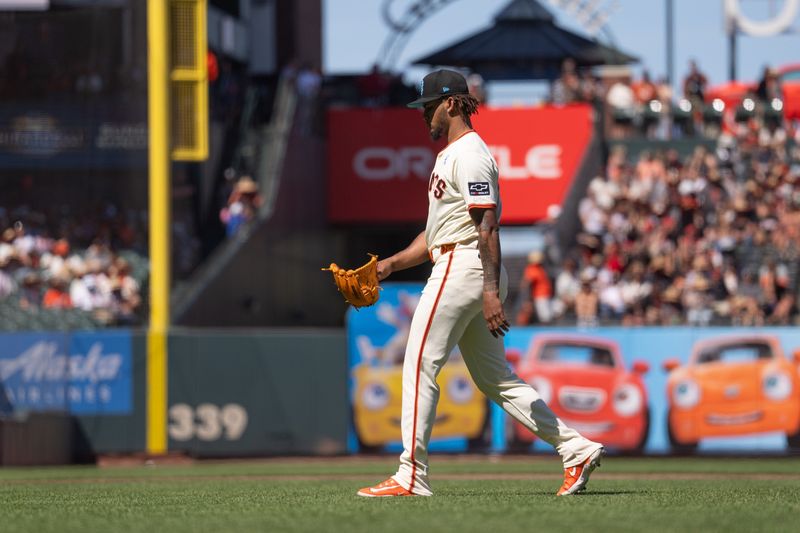 Jun 16, 2024; San Francisco, California, USA; San Francisco Giants relief pitcher Camilo Doval (75) walks off the field during the ninth inning against the Los Angeles Angels at Oracle Park. Mandatory Credit: Stan Szeto-USA TODAY Sports