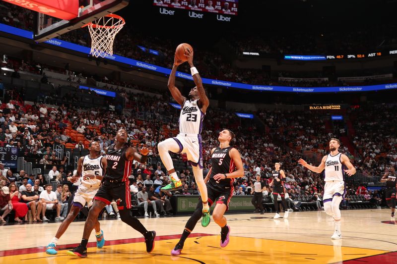 MIAMI, FL - NOVEMBER 4: Keon Ellis #23 of the Sacramento Kings dunks the ball during the game against the Miami Heat during a regular season game on November 4, 2024 at Kaseya Center in Miami, Florida. NOTE TO USER: User expressly acknowledges and agrees that, by downloading and or using this Photograph, user is consenting to the terms and conditions of the Getty Images License Agreement. Mandatory Copyright Notice: Copyright 2024 NBAE (Photo by Issac Baldizon/NBAE via Getty Images)