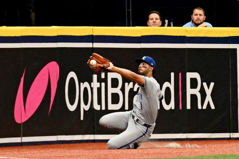 May 26, 2024; St. Petersburg, Florida, USA; Kansas City Royals left fielder MJ Melendez (1) catches a line drive in the third inning against the Tampa Bay Rays at Tropicana Field. Mandatory Credit: Jonathan Dyer-USA TODAY Sports