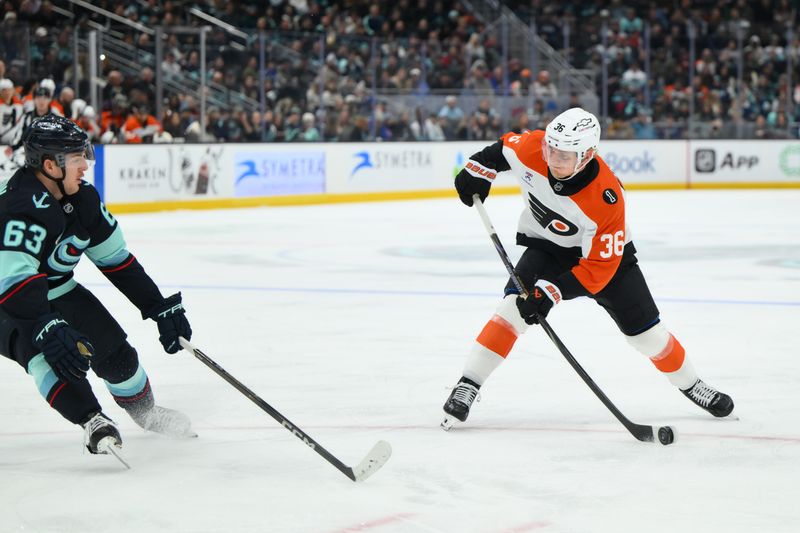 Dec 28, 2025; Seattle, Washington, USA; Philadelphia Flyers defenseman Emil Andrae (36) shoots a goal shot against the Seattle Kraken during the third period at Climate Pledge Arena. Mandatory Credit: Steven Bisig-Imagn Images