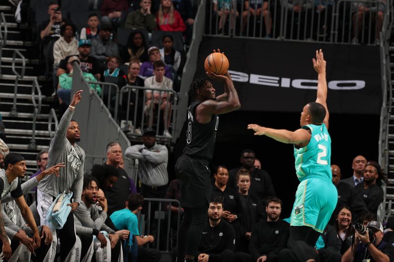 CHARLOTTE, NC - MARCH 9: Dorian Finney-Smith #28 of the Brooklyn Nets shoots a three point basket during the game against the Charlotte Hornets on March 9, 2024 at Spectrum Center in Charlotte, North Carolina. NOTE TO USER: User expressly acknowledges and agrees that, by downloading and or using this photograph, User is consenting to the terms and conditions of the Getty Images License Agreement. Mandatory Copyright Notice: Copyright 2024 NBAE (Photo by Kent Smith/NBAE via Getty Images)