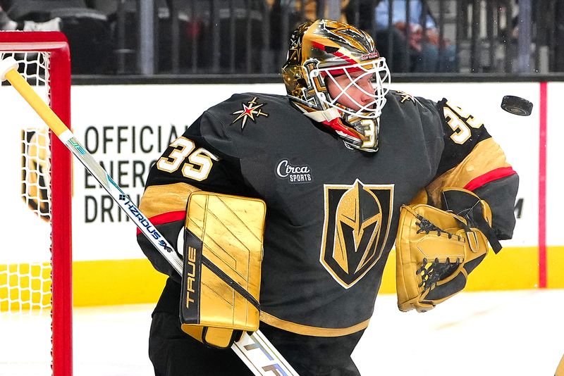 Oct 13, 2024; Las Vegas, Nevada, USA; Vegas Golden Knights goaltender Ilya Samsonov (35) makes a save against the Anaheim Ducks during the first period at T-Mobile Arena. Mandatory Credit: Stephen R. Sylvanie-Imagn Images