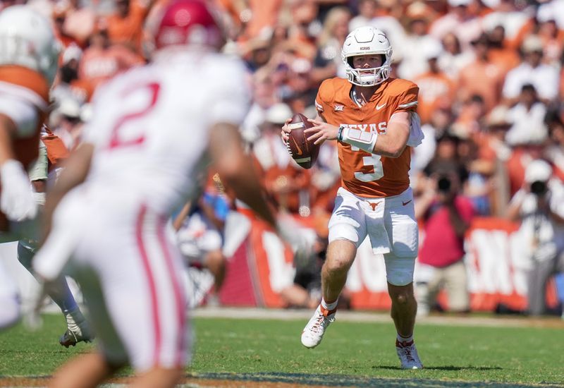 Oct 7, 2023; Dallas, Texas, USA; Texas Longhorns quarterback Quinn Ewers (3) runs the ball against the Oklahoma Sooners in the third quarter at the Cotton Bowl. This game makes up the 119th rivalry match up. Mandatory Credit: Ricardo B. Brazziell-USA TODAY Sports