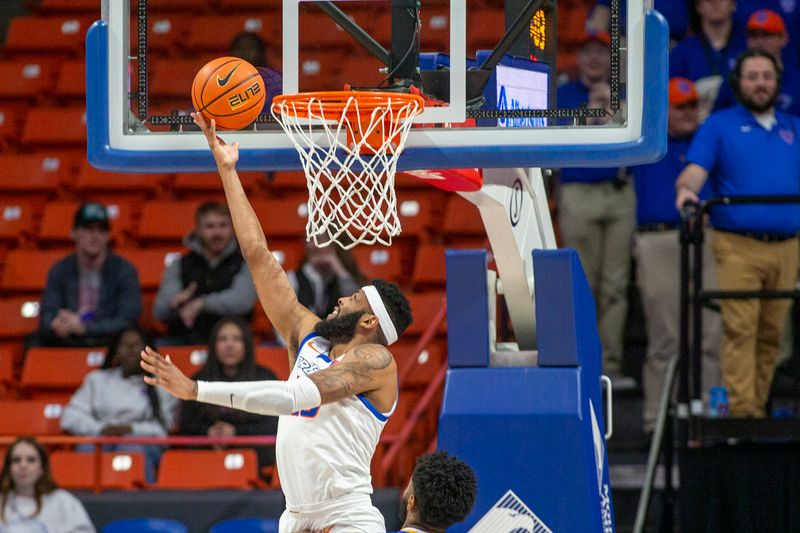 Jan 3, 2023; Boise, Idaho, USA; Boise State Broncos forward Naje Smith (23) drives to the basket during the first half against the San Jose State Spartans at ExtraMile Arena. Mandatory Credit: Brian Losness-USA TODAY Sports

