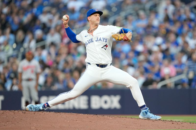 Jun 4, 2024; Toronto, Ontario, CAN; Toronto Blue Jays pitcher Bowden Francis (44) pitches to to the Baltimore Orioles during the third inning at Rogers Centre. Mandatory Credit: John E. Sokolowski-USA TODAY Sports