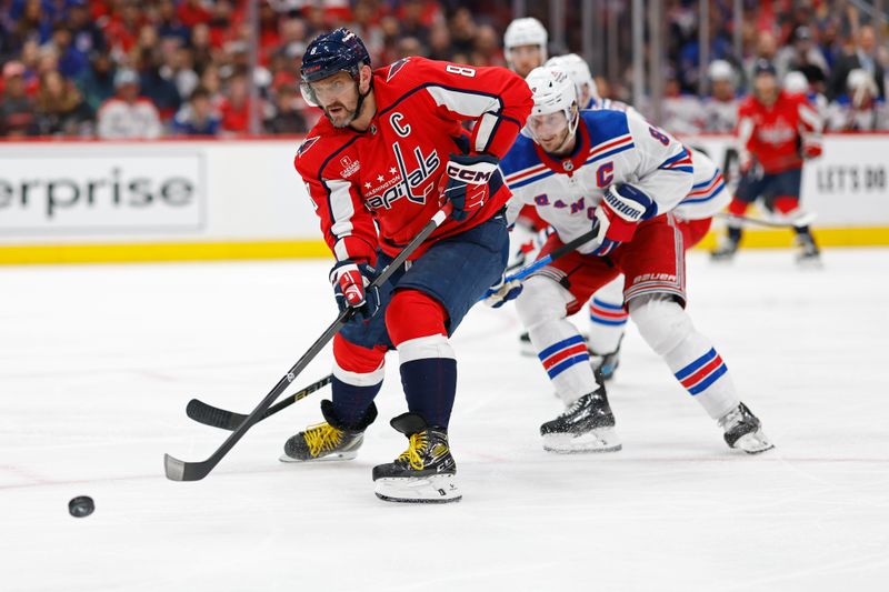 Apr 28, 2024; Washington, District of Columbia, USA; Washington Capitals left wing Alex Ovechkin (8) shoots the puck as New York Rangers defenseman Jacob Trouba (8) defends in the third period in game four of the first round of the 2024 Stanley Cup Playoffs at Capital One Arena. Mandatory Credit: Geoff Burke-USA TODAY Sports