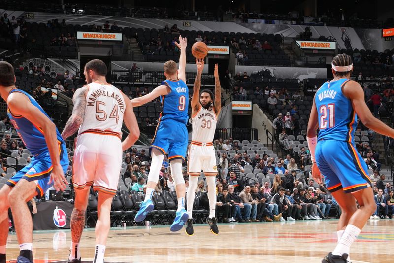 SAN ANTONIO, TX - JANUARY 24: Julian Champagnie #30 of the San Antonio Spurs shoots the ball during the game against the Oklahoma City Thunder on January 24, 2023 at the Frost Bank Center in San Antonio, Texas. NOTE TO USER: User expressly acknowledges and agrees that, by downloading and or using this photograph, user is consenting to the terms and conditions of the Getty Images License Agreement. Mandatory Copyright Notice: Copyright 2024 NBAE (Photos by Jesse D. Garrabrant/NBAE via Getty Images)