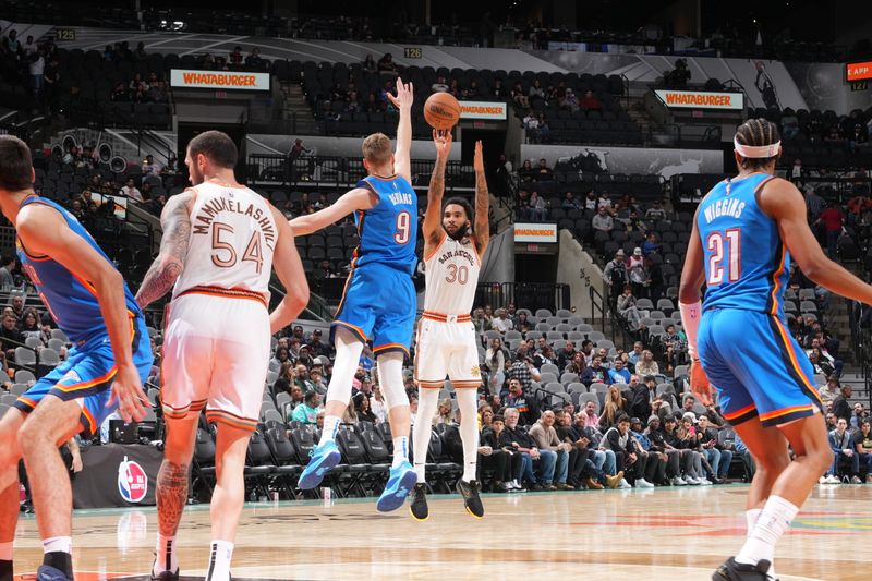 SAN ANTONIO, TX - JANUARY 24: Julian Champagnie #30 of the San Antonio Spurs shoots the ball during the game against the Oklahoma City Thunder on January 24, 2023 at the Frost Bank Center in San Antonio, Texas. NOTE TO USER: User expressly acknowledges and agrees that, by downloading and or using this photograph, user is consenting to the terms and conditions of the Getty Images License Agreement. Mandatory Copyright Notice: Copyright 2024 NBAE (Photos by Jesse D. Garrabrant/NBAE via Getty Images)