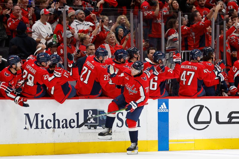 Nov 22, 2023; Washington, District of Columbia, USA; Washington Capitals right wing T.J. Oshie (77) celebrates with teammates after scoring a goal against the Buffalo Sabres in the second period at Capital One Arena. Mandatory Credit: Geoff Burke-USA TODAY Sports