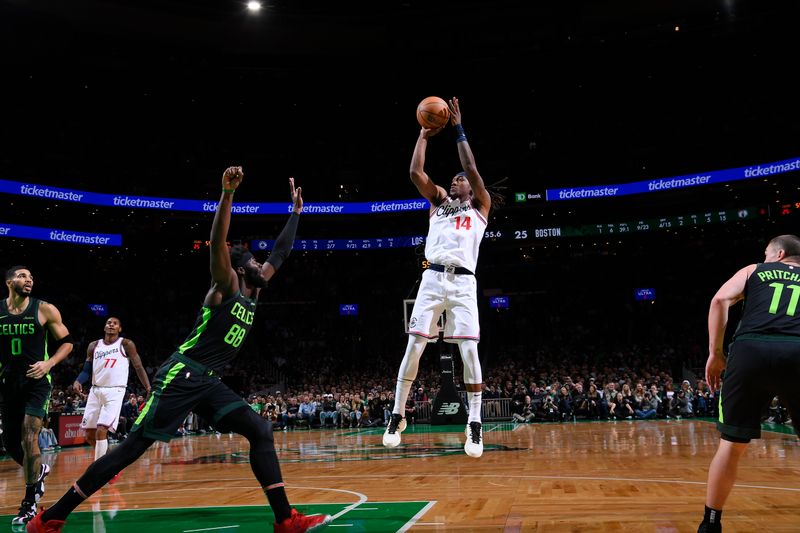 BOSTON, MA - NOVEMBER 25: Terance Mann #14 of the LA Clippers shoots the ball during the game against the Boston Celtics on November 25, 2024 at TD Garden in Boston, Massachusetts. NOTE TO USER: User expressly acknowledges and agrees that, by downloading and/or using this Photograph, user is consenting to the terms and conditions of the Getty Images License Agreement. Mandatory Copyright Notice: Copyright 2024 NBAE (Photo by Brian Babineau/NBAE via Getty Images)