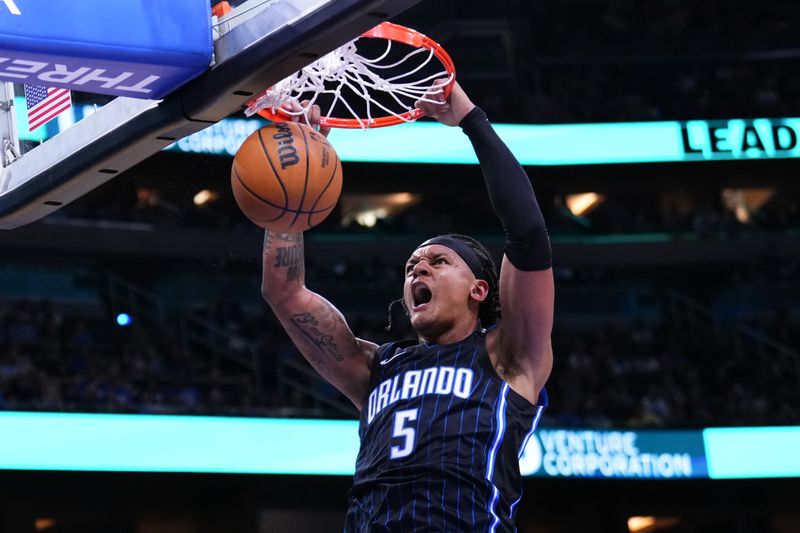 ORLANDO, FLORIDA - OCTOBER 28: Paolo Banchero #5 of the Orlando Magic dunks the ball against the Indiana Pacers during the first quarter at Kia Center on October 28, 2024 in Orlando, Florida. NOTE TO USER: User expressly acknowledges and agrees that, by downloading and or using this photograph, User is consenting to the terms and conditions of the Getty Images License Agreement. (Photo by Rich Storry/Getty Images)