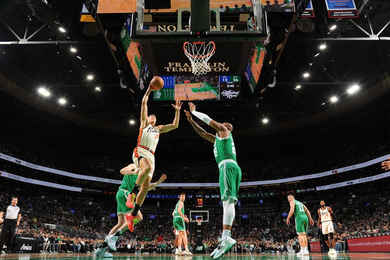 BOSTON, MA - DECEMBER 4: Simone Fontecchio #19 of the Detroit Pistons drives to the basket during the game against the Boston Celtics on December 4, 2024 at TD Garden in Boston, Massachusetts. NOTE TO USER: User expressly acknowledges and agrees that, by downloading and/or using this Photograph, user is consenting to the terms and conditions of the Getty Images License Agreement. Mandatory Copyright Notice: Copyright 2024 NBAE (Photo by Brian Babineau/NBAE via Getty Images)