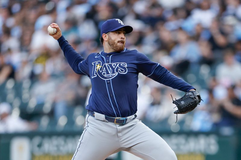 Apr 27, 2024; Chicago, Illinois, USA; Tampa Bay Rays starting pitcher Aaron Civale (34) delivers a pitch against the Chicago White Sox during the first inning at Guaranteed Rate Field. Mandatory Credit: Kamil Krzaczynski-USA TODAY Sports