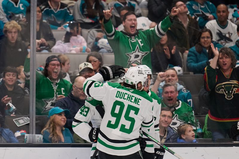 Jan 10, 2026; San Jose, California, USA; Dallas Stars center Justin Hryckowian (49) (obscured) celebrates with centers Justin Hryckowian (49) and Matt Duchene (95) after scoring a goal against the San Jose Sharks during the first period at SAP Center at San Jose. Mandatory Credit: Robert Edwards-Imagn Images