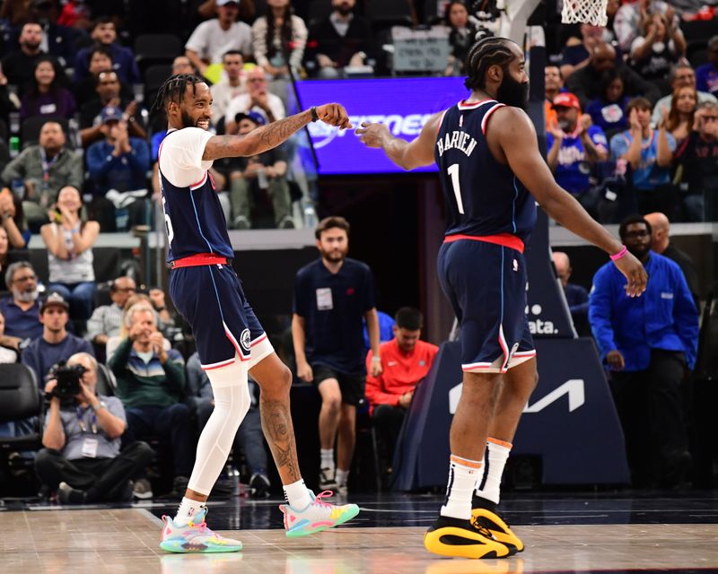 INGLEWOOD, CA - OCTOBER 30: James Harden #1 and Derrick Jones Jr. #55 of the LA Clippers celebrates during the game against the Portland Trail Blazers on October 30, 2024 at Intuit Dome in Los Angeles, California. NOTE TO USER: User expressly acknowledges and agrees that, by downloading and/or using this Photograph, user is consenting to the terms and conditions of the Getty Images License Agreement. Mandatory Copyright Notice: Copyright 2024 NBAE (Photo by Adam Pantozzi/NBAE via Getty Images)