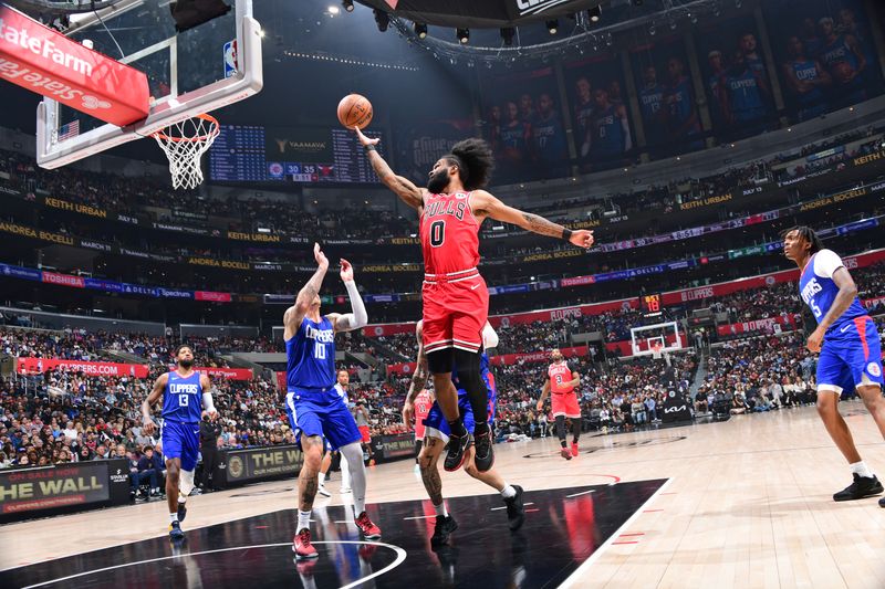 LOS ANGELES, CA - MARCH 9: Coby White #0 of the Chicago Bulls shoots the ball during the game against the LA Clippers on March 9, 2024 at Crypto.Com Arena in Los Angeles, California. NOTE TO USER: User expressly acknowledges and agrees that, by downloading and/or using this Photograph, user is consenting to the terms and conditions of the Getty Images License Agreement. Mandatory Copyright Notice: Copyright 2024 NBAE (Photo by Adam Pantozzi/NBAE via Getty Images)