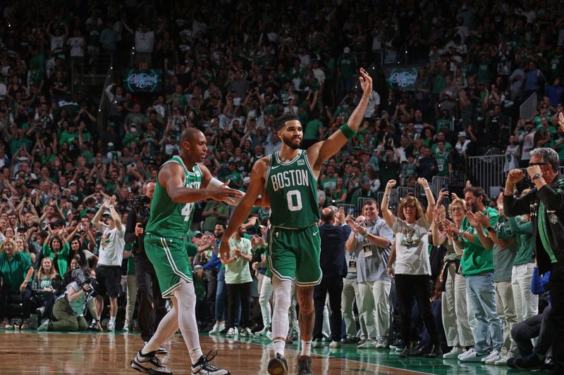 BOSTON, MA - JUNE 17: Jayson Tatum #0 of the Boston Celtics celebrates during the game against the Dallas Mavericks during Game 5 of the 2024 NBA Finals on June 17, 2024 at the TD Garden in Boston, Massachusetts. NOTE TO USER: User expressly acknowledges and agrees that, by downloading and or using this photograph, User is consenting to the terms and conditions of the Getty Images License Agreement. Mandatory Copyright Notice: Copyright 2024 NBAE  (Photo by Nathaniel S. Butler/NBAE via Getty Images)