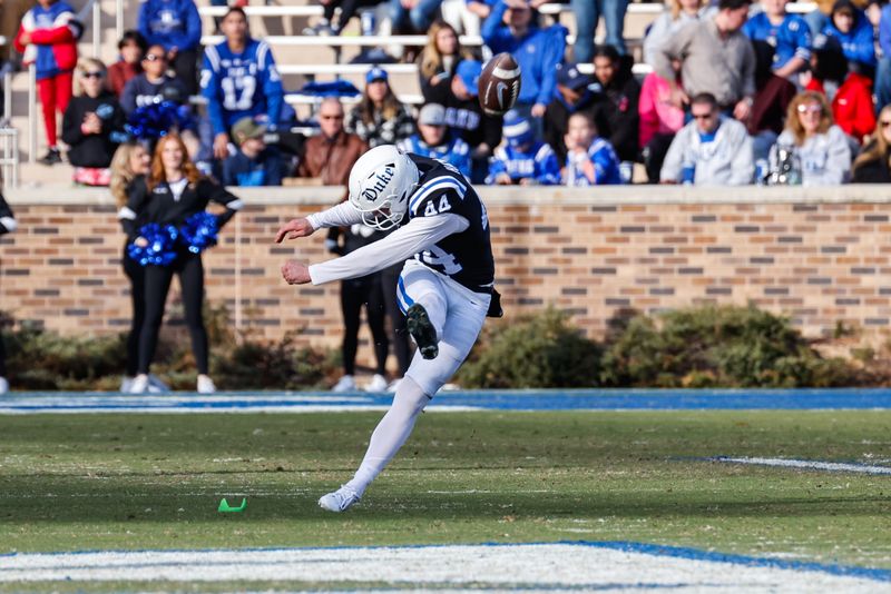 Nov 25, 2023; Durham, North Carolina, USA; Duke Blue Devils place kicker Charlie Ham (44) kicks the football during the second half of the game against Pittsburgh Panthers at Wallace Wade Stadium.  Mandatory Credit: Jaylynn Nash-USA TODAY Sports