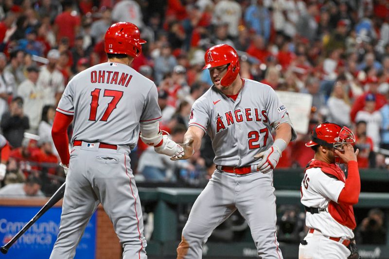 May 3, 2023; St. Louis, Missouri, USA;  Los Angeles Angels center fielder Mike Trout (27) is congratulated by starting pitcher Shohei Ohtani (17) after hitting a go-ahead solo home run against the St. Louis Cardinals during the ninth inning at Busch Stadium. Mandatory Credit: Jeff Curry-USA TODAY Sports