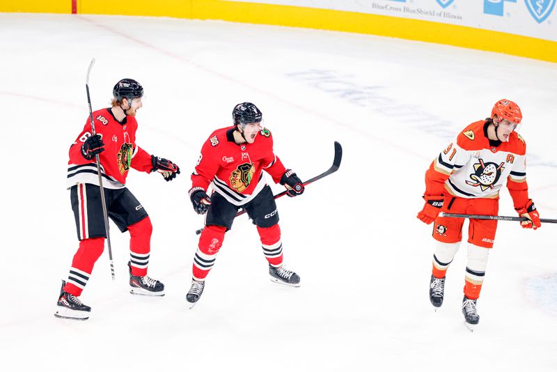 Oct 19, 2025; Chicago, Illinois, USA; Chicago Blackhawks center Ryan Donato (8) celebrates after scoring in overtime a game winning goal against the Anaheim Ducks at United Center. Mandatory Credit: Kamil Krzaczynski-Imagn Images