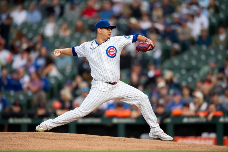 Aug 20, 2024; Chicago, Illinois, USA; Chicago Cubs starting pitcher Javier Assad (72) pitches during the first inning against the Detroit Tigers at Wrigley Field. Mandatory Credit: Patrick Gorski-USA TODAY Sports