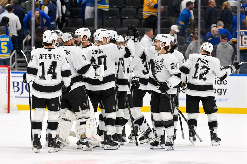 Oct 21, 2025; St. Louis, Missouri, USA;  Los Angeles Kings celebrate after defeating the St. Louis Blues in overtime at Enterprise Center. Mandatory Credit: Jeff Curry-Imagn Images