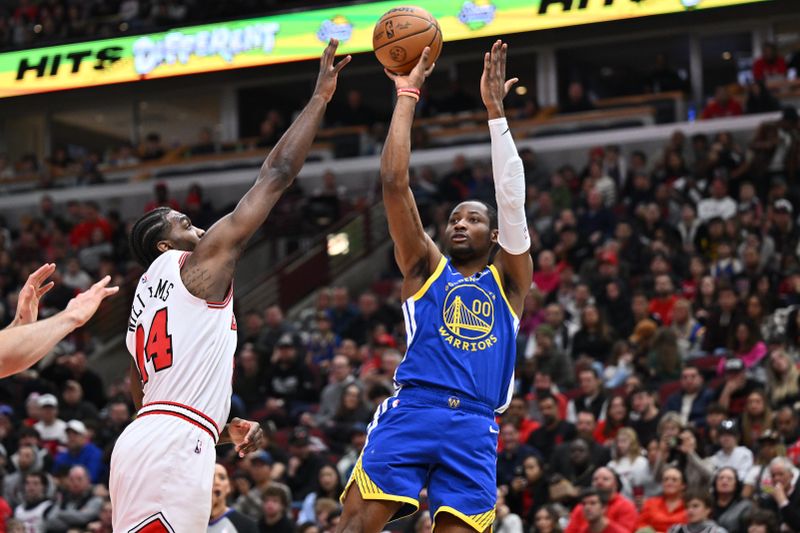 CHICAGO, ILLINOIS - JANUARY 12:  Jonathan Kuminga shoots over Patrick Williams #44 of the Chicago Bulls in the second half on January 12, 2024 at United Center in Chicago, Illinois. Golden State defeated Chicago 140-131.   NOTE TO USER: User expressly acknowledges and agrees that, by downloading and or using this photograph, User is consenting to the terms and conditions of the Getty Images License Agreement.  (Photo by Jamie Sabau/Getty Images)