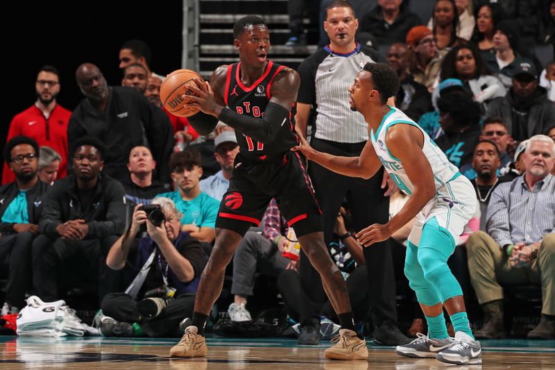 CHARLOTTE, NC - JANUARY 1: Dennis Schroder #17 of the Toronto Raptors handles the ball during the game against the Charlotte Hornets on January 1, 2024 at Spectrum Center in Charlotte, North Carolina. NOTE TO USER: User expressly acknowledges and agrees that, by downloading and or using this photograph, User is consenting to the terms and conditions of the Getty Images License Agreement. Mandatory Copyright Notice: Copyright 2024 NBAE (Photo by Kent Smith/NBAE via Getty Images)