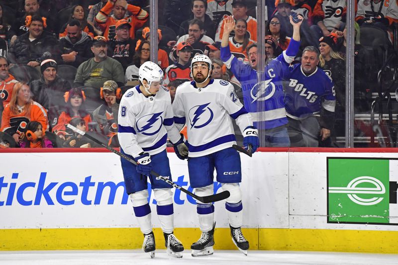 Feb 27, 2024; Philadelphia, Pennsylvania, USA; Tampa Bay Lightning left wing Nicholas Paul (20) celebrates his goal with defenseman Emil Martinsen Lilleberg (78) against the Philadelphia Flyers during the second period at Wells Fargo Center. Mandatory Credit: Eric Hartline-USA TODAY Sports