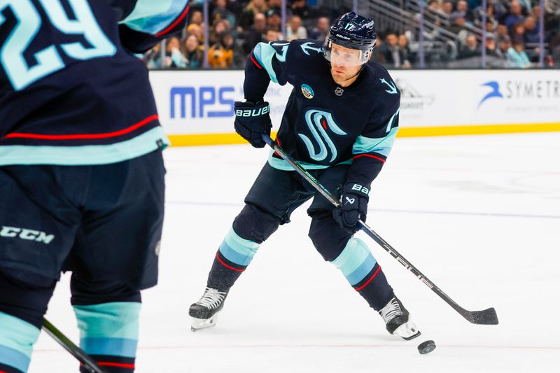 Feb 26, 2024; Seattle, Washington, USA; Seattle Kraken center Jaden Schwartz (17) shoots the puck against the Boston Bruins during the first period at Climate Pledge Arena. Mandatory Credit: Joe Nicholson-USA TODAY Sports