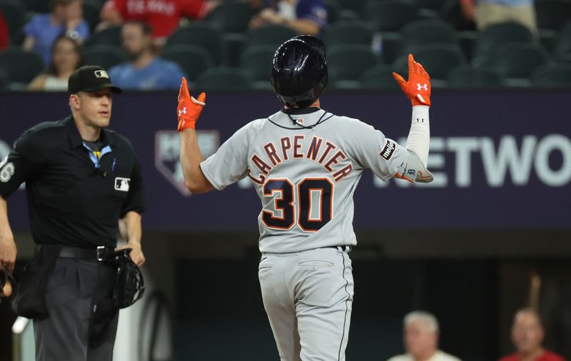 Jun 28, 2023; Arlington, Texas, USA;  Detroit Tigers right fielder Kerry Carpenter (30) reacts after hitting a two-run home run during the ninth inning against the Texas Rangers at Globe Life Field. Mandatory Credit: Kevin Jairaj-USA TODAY Sports