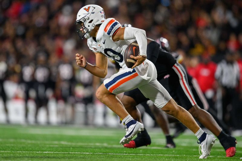 Sep 15, 2023; College Park, Maryland, USA; Virginia Cavaliers quarterback Anthony Colandrea (10) runs the ball during the second quarter against the Maryland Terrapins at SECU Stadium. Mandatory Credit: Reggie Hildred-USA TODAY Sports