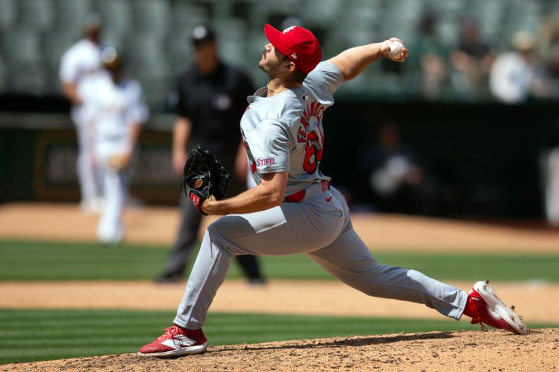 Apr 17, 2024; Oakland, California, USA; St. Louis Cardinals pitcher Ryan Fernandez (64) delivers a pitch against the Oakland Athletics during the sixth inning at Oakland-Alameda County Coliseum. Mandatory Credit: D. Ross Cameron-USA TODAY Sports