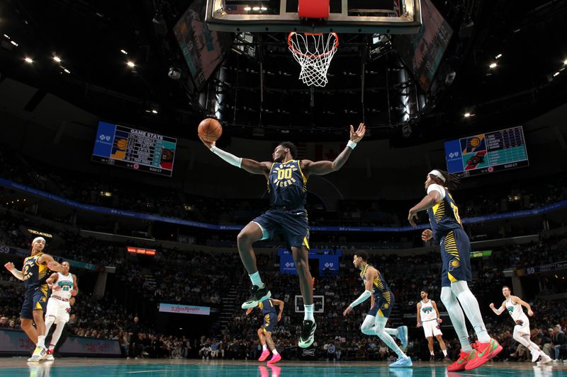 MEMPHIS, TN - DECEMBER 1: Bennedict Mathurin #00 of the Indiana Pacers rebounds during the game against the Memphis Grizzlies on December 1, 2024 at FedExForum in Memphis, Tennessee. NOTE TO USER: User expressly acknowledges and agrees that, by downloading and or using this photograph, User is consenting to the terms and conditions of the Getty Images License Agreement. Mandatory Copyright Notice: Copyright 2024 NBAE (Photo by Joe Murphy/NBAE via Getty Images)