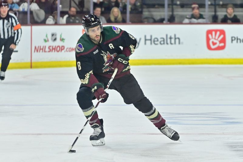 Dec 19, 2023; Tempe, Arizona, USA; Arizona Coyotes center Nick Schmaltz (8) carries the puck into the Ottawa Senators zone in the second period at Mullett Arena. Mandatory Credit: Matt Kartozian-USA TODAY Sports