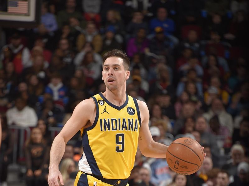 CLEVELAND, OH - APRIL 2:  T.J. McConnell #9 of the Indiana Pacers handles the ball during the game  on April 2, 2023 at Rocket Mortgage FieldHouse in Cleveland, Ohio. NOTE TO USER: User expressly acknowledges and agrees that, by downloading and/or using this Photograph, user is consenting to the terms and conditions of the Getty Images License Agreement. Mandatory Copyright Notice: Copyright 2023 NBAE (Photo by David Liam Kyle/NBAE via Getty Images)