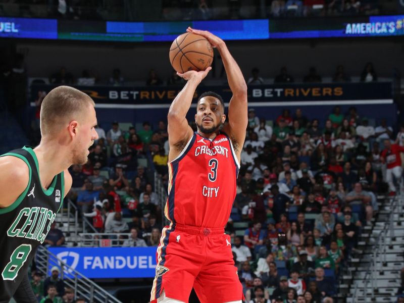 NEW ORLEANS, LA - MARCH 30: CJ McCollum #3 of the New Orleans Pelicans three point basket during the game against the Boston Celtics on March 30, 2024 at the Smoothie King Center in New Orleans, Louisiana. NOTE TO USER: User expressly acknowledges and agrees that, by downloading and or using this Photograph, user is consenting to the terms and conditions of the Getty Images License Agreement. Mandatory Copyright Notice: Copyright 2024 NBAE (Photo by Layne Murdoch Jr./NBAE via Getty Images)